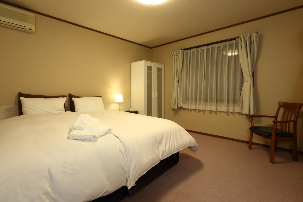 Snowlines Lodge Χακούμπα Δωμάτιο φωτογραφία